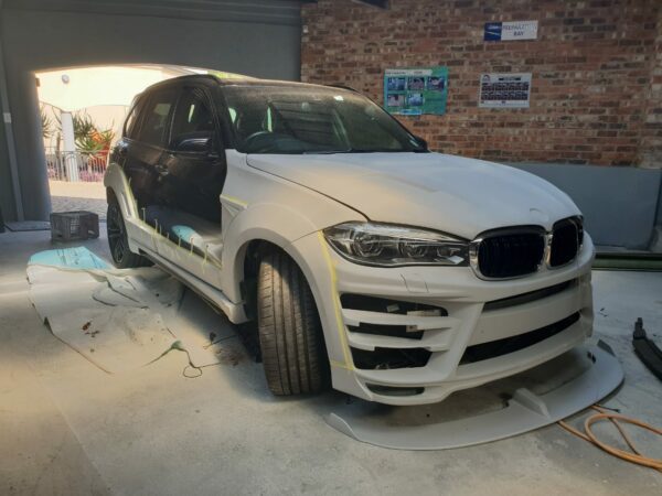 MODIFICATION DE CARROSSERIE POUR BMW X5 F15 au garage